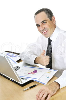 Businessman at his desk on white background