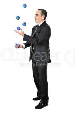 Businessman juggling