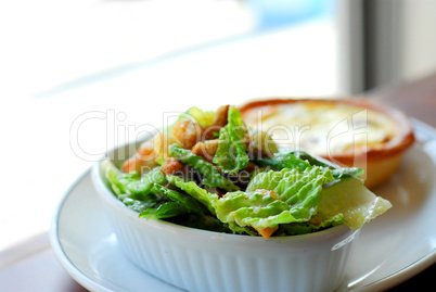Caesar salad and quiche