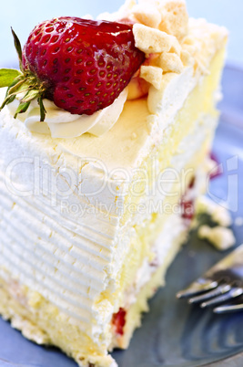 Slice of strawberry meringue cake