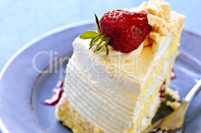 Slice of strawberry meringue cake