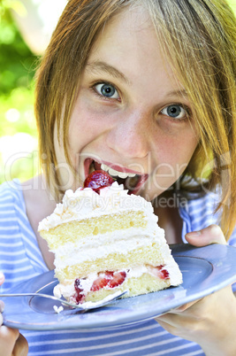 Girl eating a cake