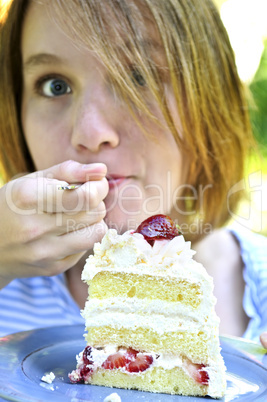 Girl eating a cake