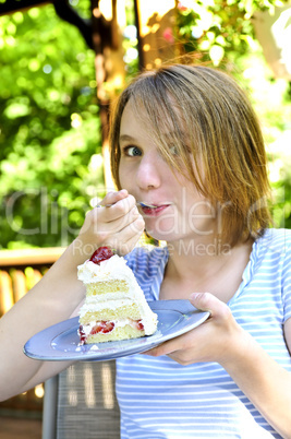 Girl eating a cake