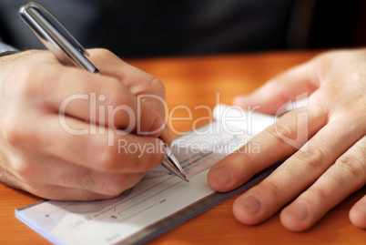Man writing a check