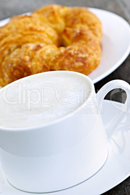 Latte coffee and croissant