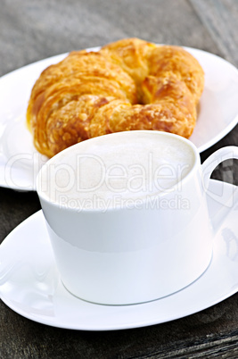 Latte coffee and croissant