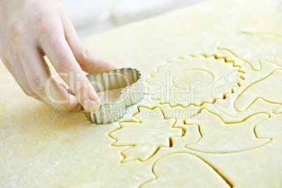 Cutting out cookies from dough