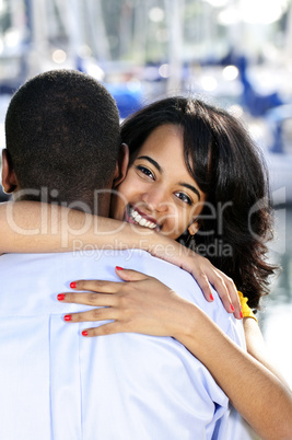 Happy woman hugging man