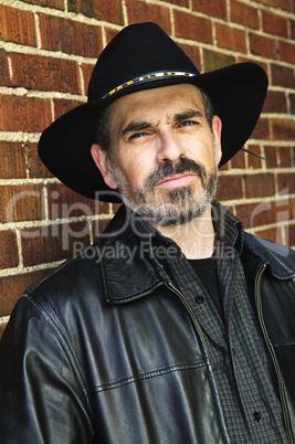 Bearded man in cowboy hat