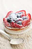 Fruit tart with spoon