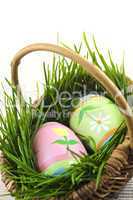 Easter eggs with green grass