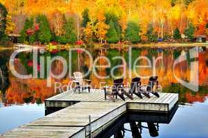 Wooden dock on autumn lake