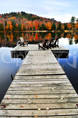 Wooden dock on autumn lake