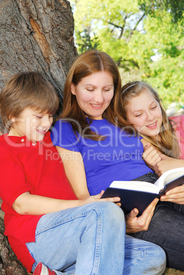 Family reading a book