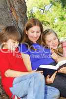 Family reading a book