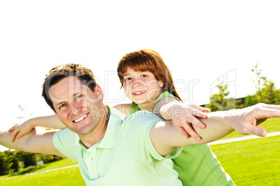 Father and daughter piggyback