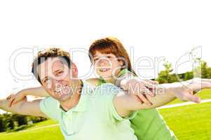 Father and daughter piggyback