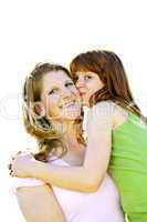 Mother and daughter hugging
