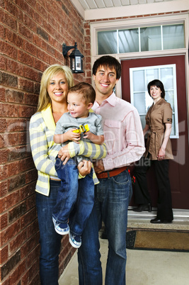 Happy family with real estate agent