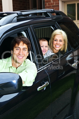 Happy family in car