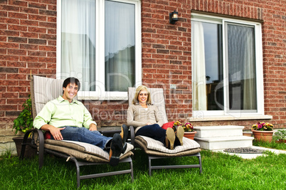 Happy couple relaxing at home