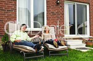 Happy couple relaxing at home