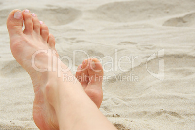 Woman feet beach