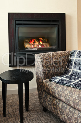 Fireplace and armchair