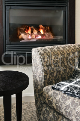Fireplace and armchair
