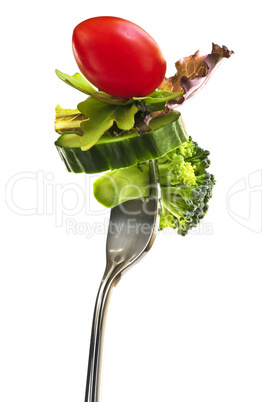 Fresh vegetables on a fork
