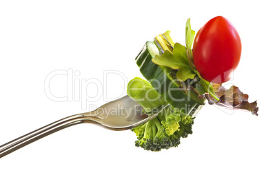 Fresh vegetables on a fork