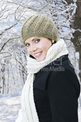 Happy woman outside in winter