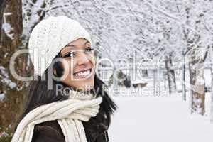 Happy woman outside in winter