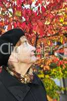 Senior woman in fall park
