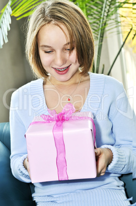 Teenage girl with present