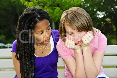 Teenager consoling her friend