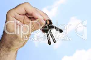 Hand holding keys