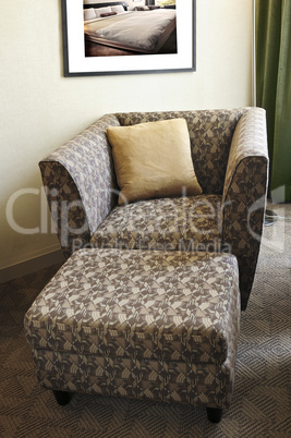 Armchair with ottoman