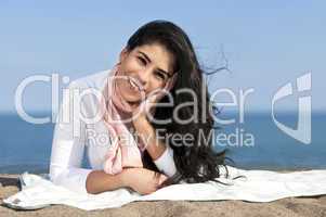 Young native american woman at beach