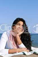 Young native american woman at beach