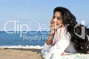 Young native american woman at beach