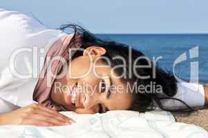 Young native american woman at beach