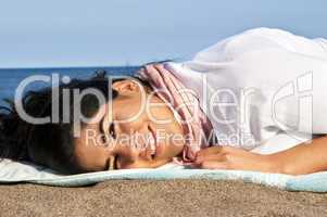 Young native american woman at beach