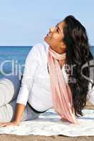 Young native american woman at beach