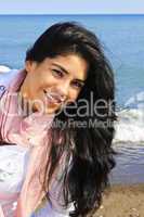 Beautiful young woman at beach