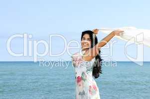 Beautiful young woman at beach