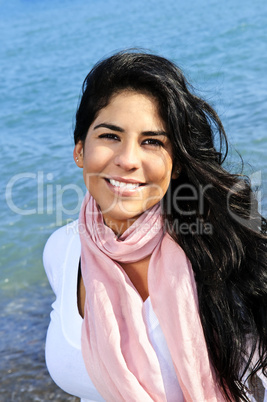 Beautiful young woman at beach