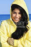 Beautiful young woman in raincoat