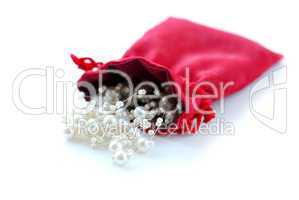Pearls in red pouch